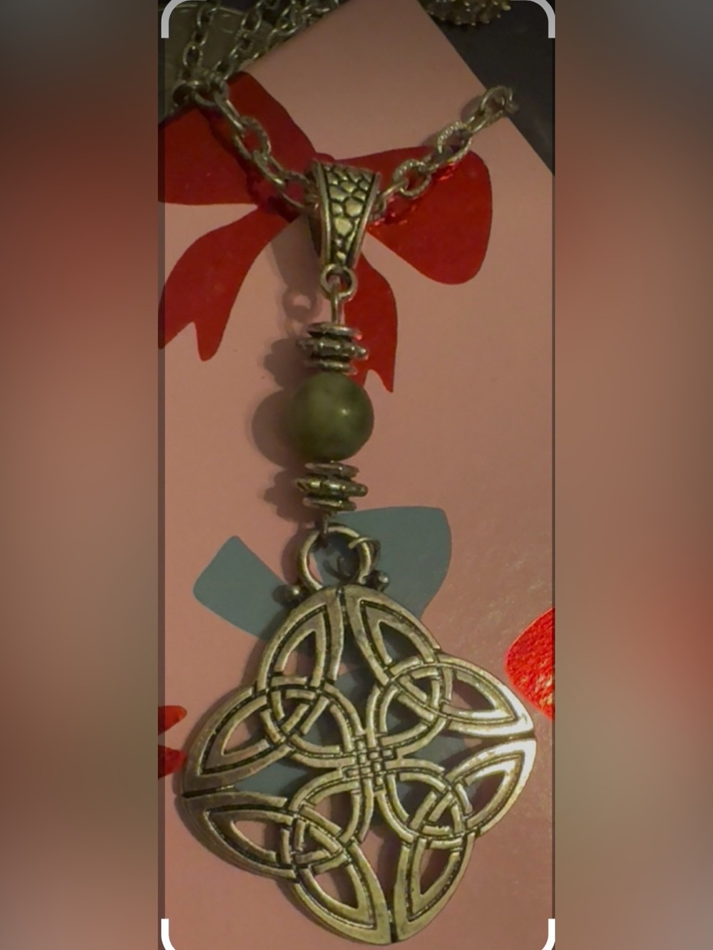 Silver Celtic Knot Pendant Necklace with Olive Bead